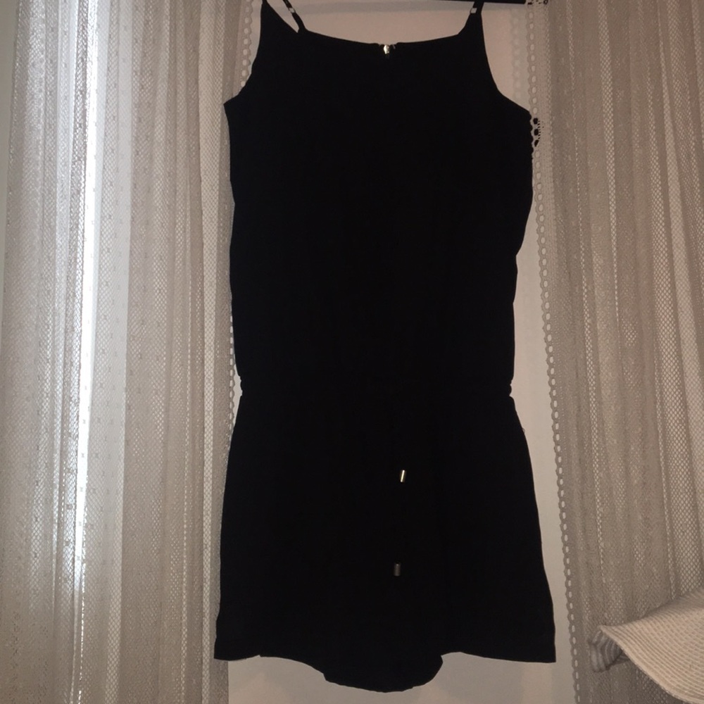 black romper with white side detail